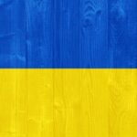 gorgeous Ukraine flag painted on a wood plank texture
